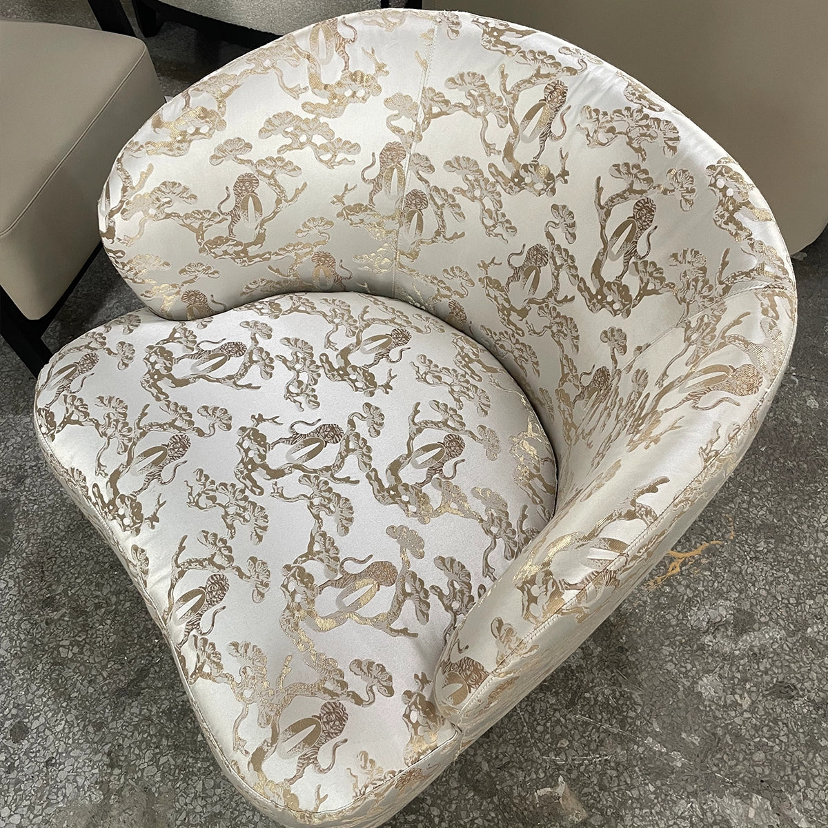 Elegant Single Armchair with Golden Floral Patterned Upholstery