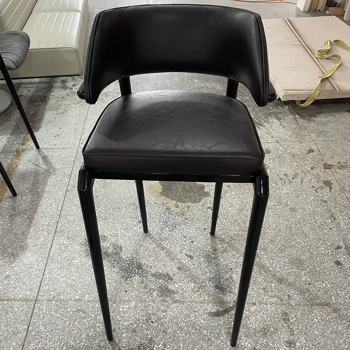 Modern Black Leather High-Leg Chair with Sleek Design