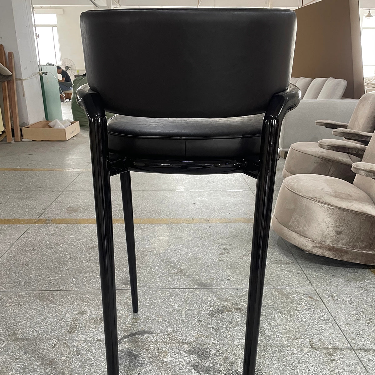 Modern Black Leather High-Leg Chair with Sleek Design