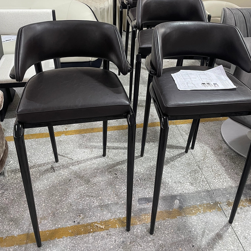 Modern Black Leather High-Leg Chair with Sleek Design