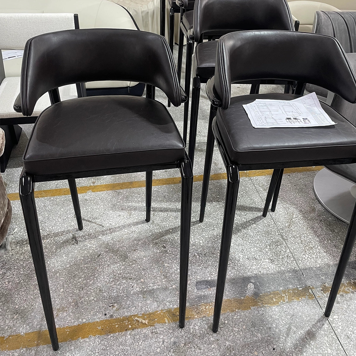 Modern Black Leather High-Leg Chair with Sleek Design