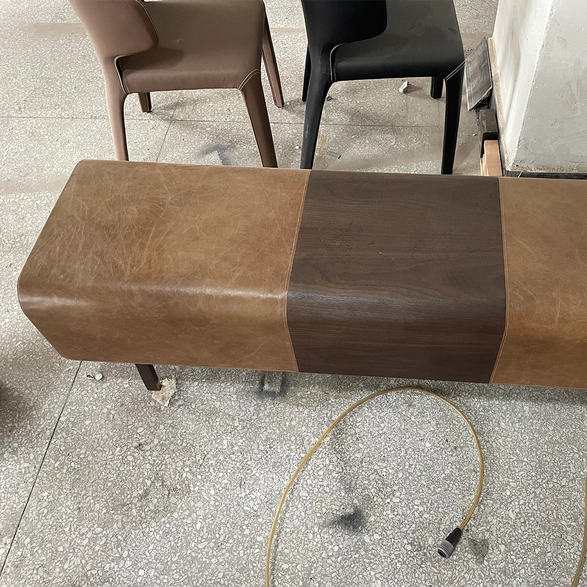 Modern Brown Leather Bench with Slanted Legs and Contrast Stitching