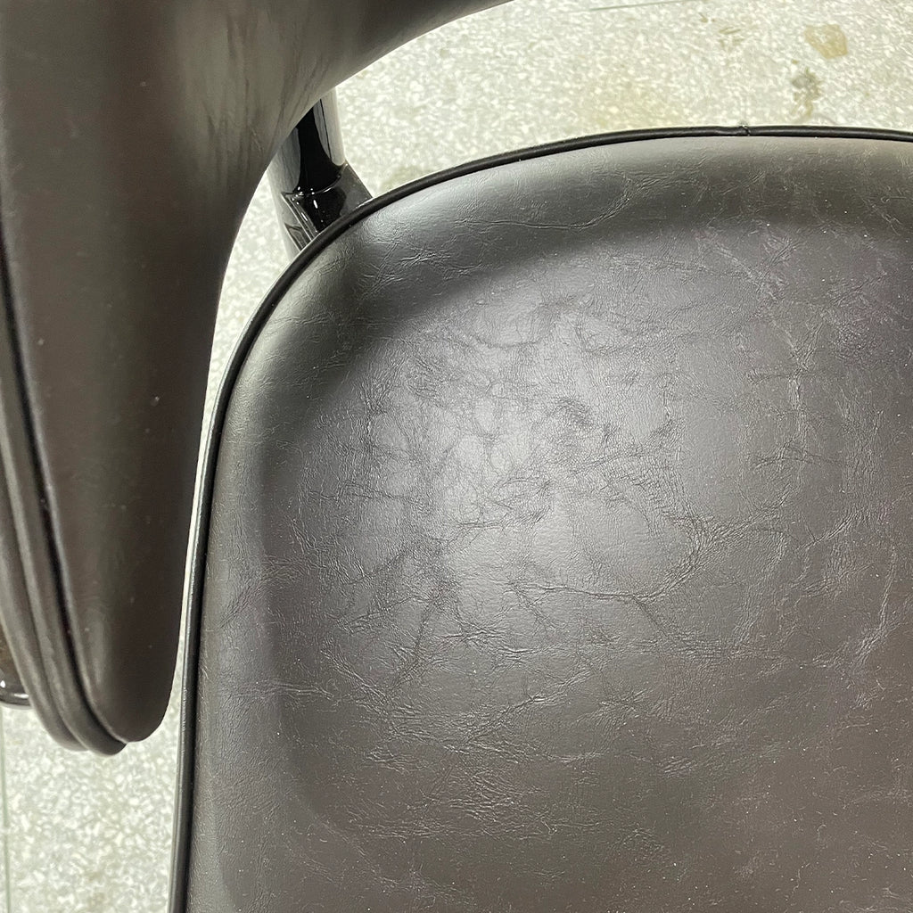 Modern Black Leather High-Leg Chair with Sleek Design